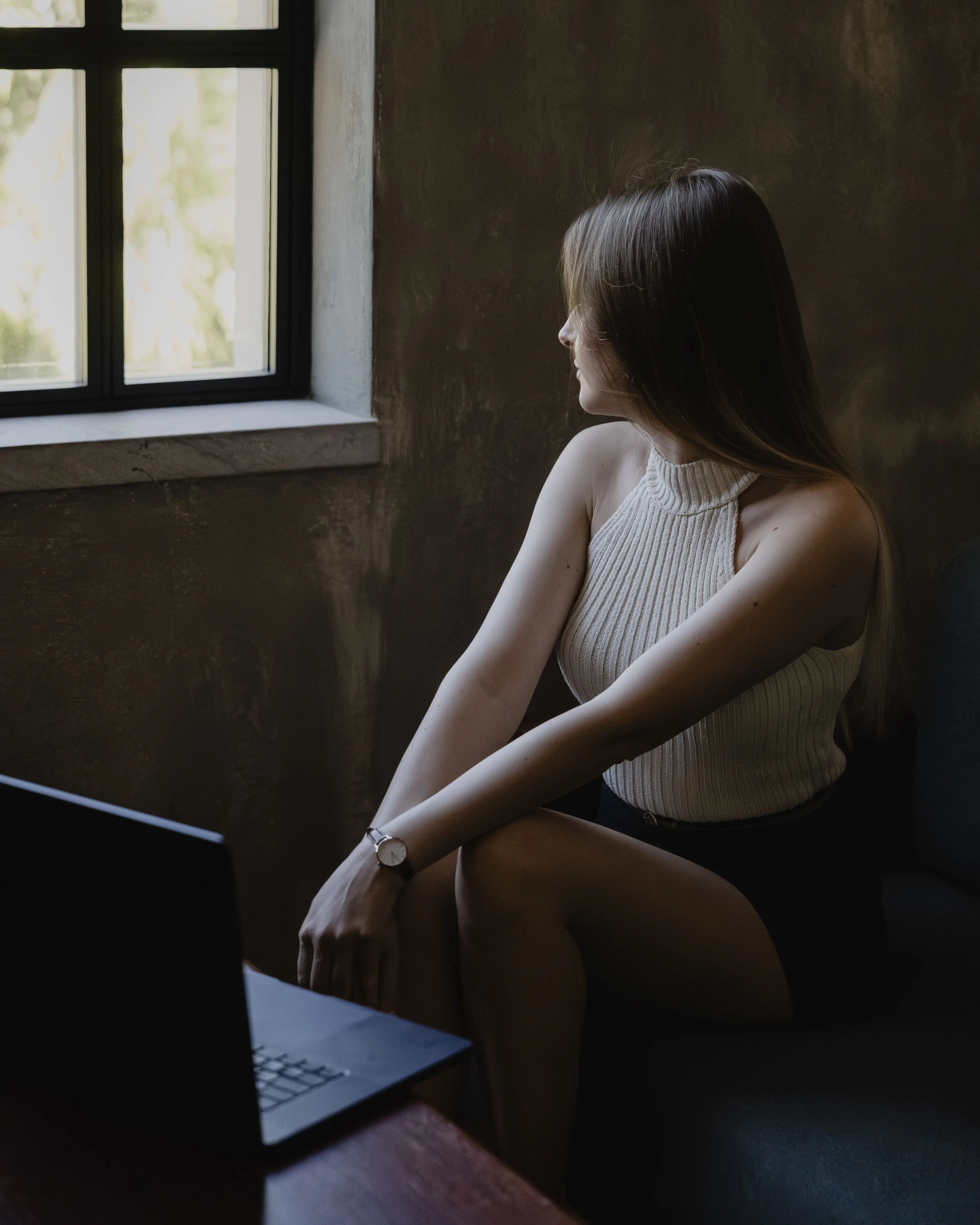 Timeea watching outside of the window